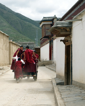 Monks riding on a tricycleのeditorial素材