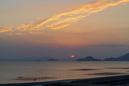 Sunset over the beachの写真素材
