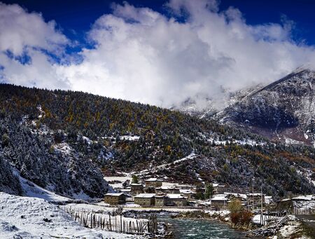Tibetan village with snow sceneの写真素材