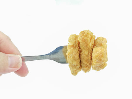 chicken nuggets on a white background