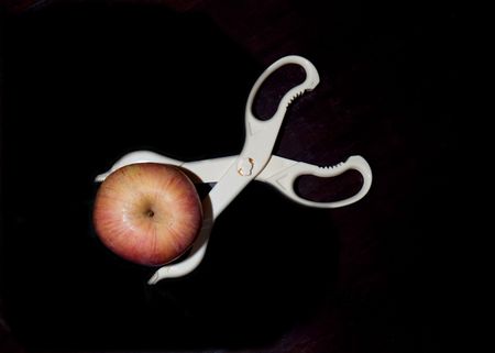 2009, Shanghai, China, an apple and a plastic clip.