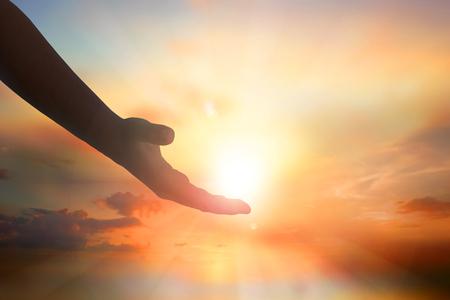 Hands of Jesus Christ silhouetteの写真素材