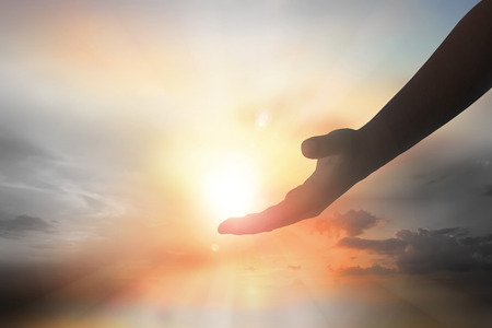 Hands of Jesus Christ silhouetteの写真素材