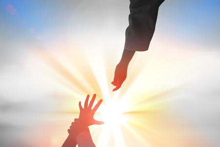 hleping Hands of Jesus Christ silhouetteの写真素材