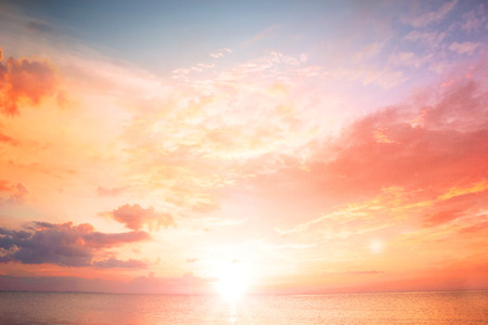 Background of colorful sky concept: Dramatic sunset with twilight color sky and clouds.の写真素材