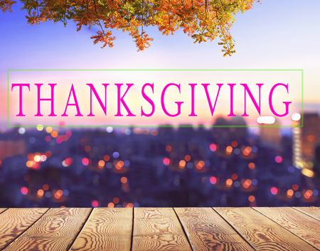 Thanksgiving concept: Bokeh light and blur city skyline sunrise backgroundの写真素材