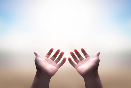 Prayer and worship concept: Christian man with open hands worship christianの写真素材