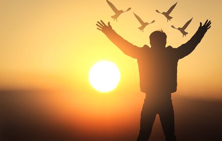 International Day of Peace concept: silhouette young men were prayingの写真素材