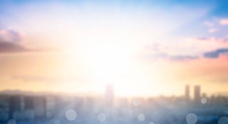 World Cities Day concept: Abstract view city on twilight color sky and clouds cityscape backgroundの写真素材