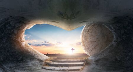 Easter concept: Empty Tomb Of Jesus Christ At Sunrise With Cross backgroundの写真素材