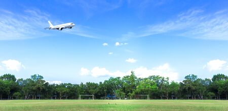 World Environment Day concept: Airplane in the blue sky and cloudの写真素材