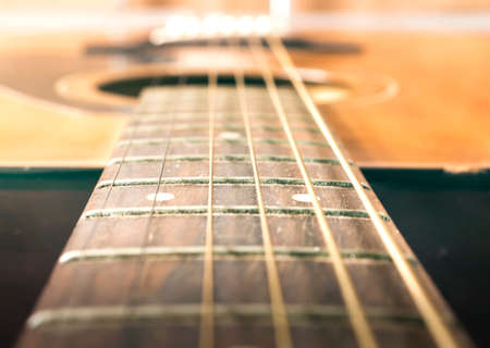 Music concept: Acoustic guitar on soft light backgroundの写真素材