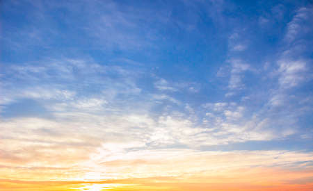 Sunrise sky background concept: Scenic orange sunset sky backgroundの写真素材