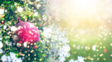 Christmas concept: Decorated Christmas tree on blurred backgroundの写真素材