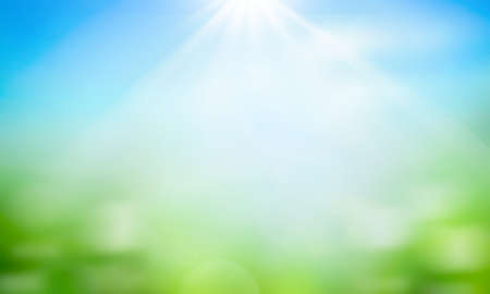 World environment day concept: green grass and blue sky abstract background with bokehの写真素材