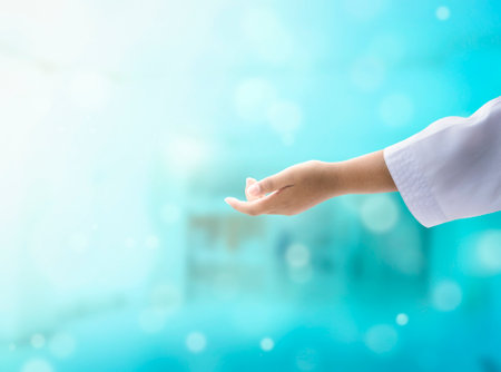 Doctor helping and serving handsの写真素材