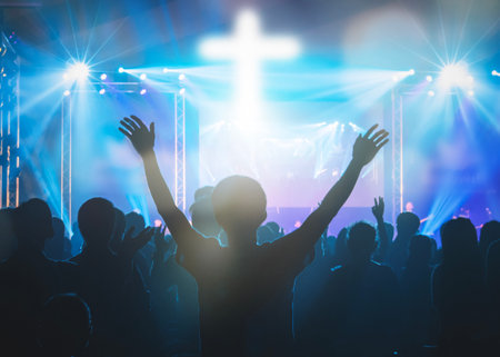 Hand praying and raised hand worship with faith,の写真素材