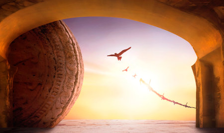 Easter and Good Friday concept, Silhouette of flying birds and broken chain in empty tomb on sunset...