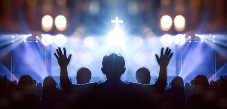 Easter and Good Friday concept, soft focus of Christian worship with raised hand on white cross backgroundの写真素材