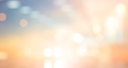 Abstract blurred beautiful glowing pastel pink and yellow gradient backgroundの写真素材