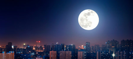 Mid-Autumn Festival Concept: Full moon over the city at night. Panoramic view.の写真素材