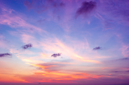 Beautiful sunset sky background. Colorful twilight sky with cloud.の写真素材