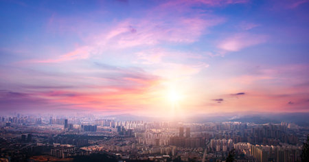 Beautiful panoramic aerial view of city at sunsetの写真素材