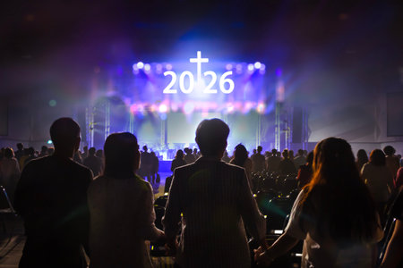 New year 2026 worship god concert in front of the crowd. Silhouettes of people.の写真素材