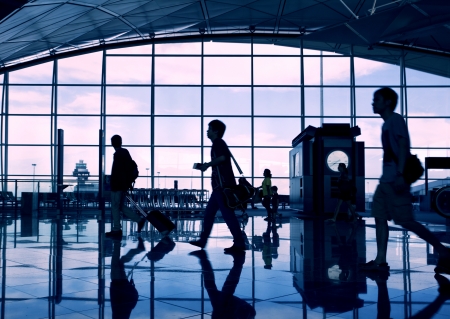 Airport terminal hall. Walking travelersの写真素材