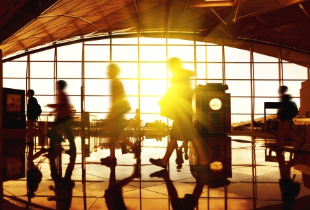 Airport terminal hall. Walking travelersの写真素材