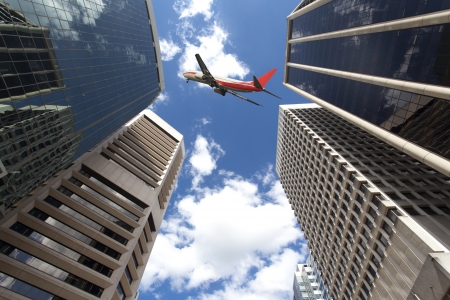 Modern city buildings and aircraft in Brisbaneの写真素材