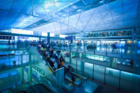 Flow of people on the escalator of the airport terminal in Hong Kongのeditorial素材