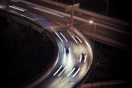 Night light car lights on the overpass