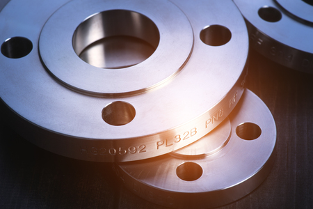 Blue tones of the industrial metal flange, more than a combination and flange close-up