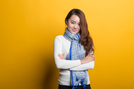 On a yellow background, the Chinese girl's various expressions display, embodies the charm of Chinese girlsの写真素材