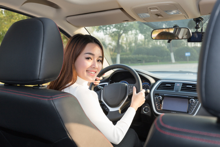 Chinese girl in the car, a moment of modern lifeのeditorial素材