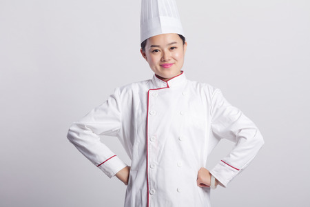 White Background, Chinese Girl Wearing Chef Dress Up Making Various Expressions, Asian Style People Seriesの写真素材