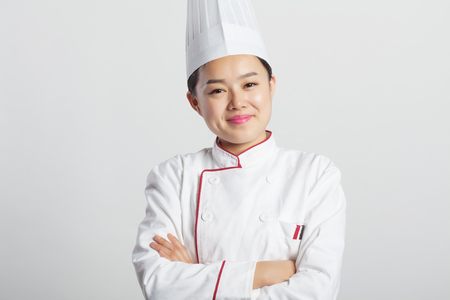 White Background, Chinese Girl Wearing Chef Dress Up Making Various Expressions, Asian Style People Seriesの写真素材