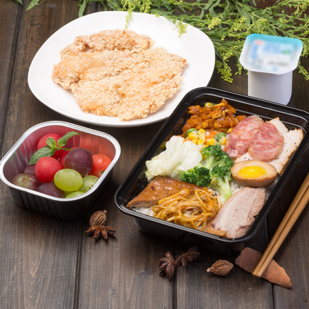 Chinese-style fast food lunch, which to rice, meat, vegetables and other Chinese people eat food-basedの写真素材