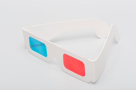 On a gray background, the various details of the combination of three-dimensional red and blue glassesの写真素材