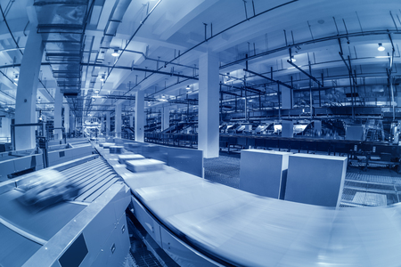 Large-scale logistics sorting center line interior, blue toneのeditorial素材