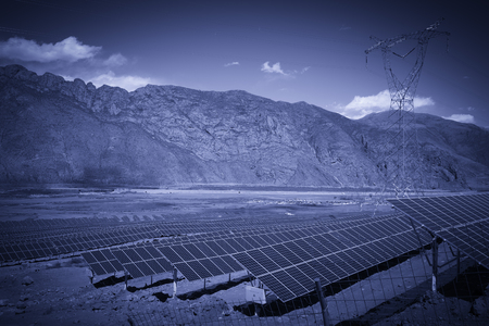 Outdoor mountain solar panels in blue toneの写真素材