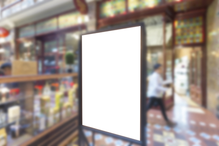 Advertising light box inside shopping mall , blurred backgroundの写真素材