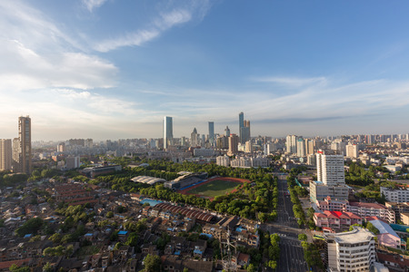 China Wuxi, the emerging city of the construction skyline in the eveningの写真素材