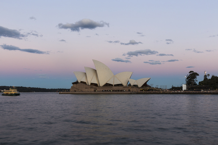 2016.10.18 Sydney Harbor, Australia, harbor port construction and ships in the evening, the famous Sydney Opera House in the distance, beautiful landscapeのeditorial素材
