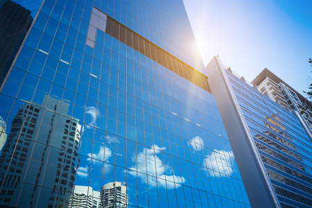 Reflective exterior facades of urban buildingsの写真素材
