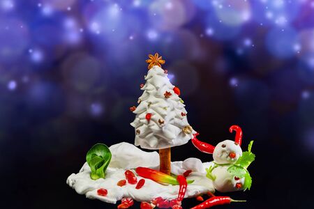 Christmas greeting card made with ingredients, with snowman and Christmas treeの写真素材