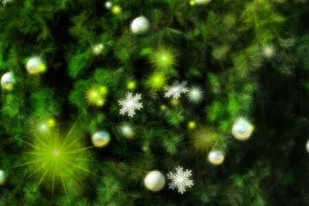 Christmas greeting card background, many Christmas ornaments on the Christmas treeの写真素材