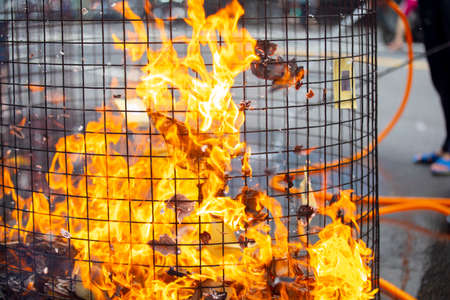 Chinese traditional religious practices, Zhongyuan Purdue, Chinese Ghost Festival, believers burned paper moneyの写真素材