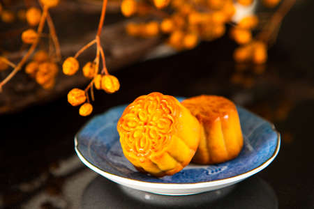 Chinese festival, the family reunited for the Mid-Autumn Festival, enjoying moon cakes,の写真素材